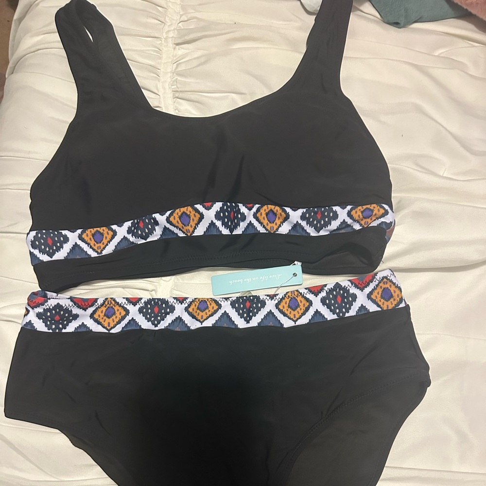 Large swim suit.   Brand new